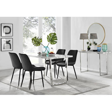 Black and chrome table and online chairs